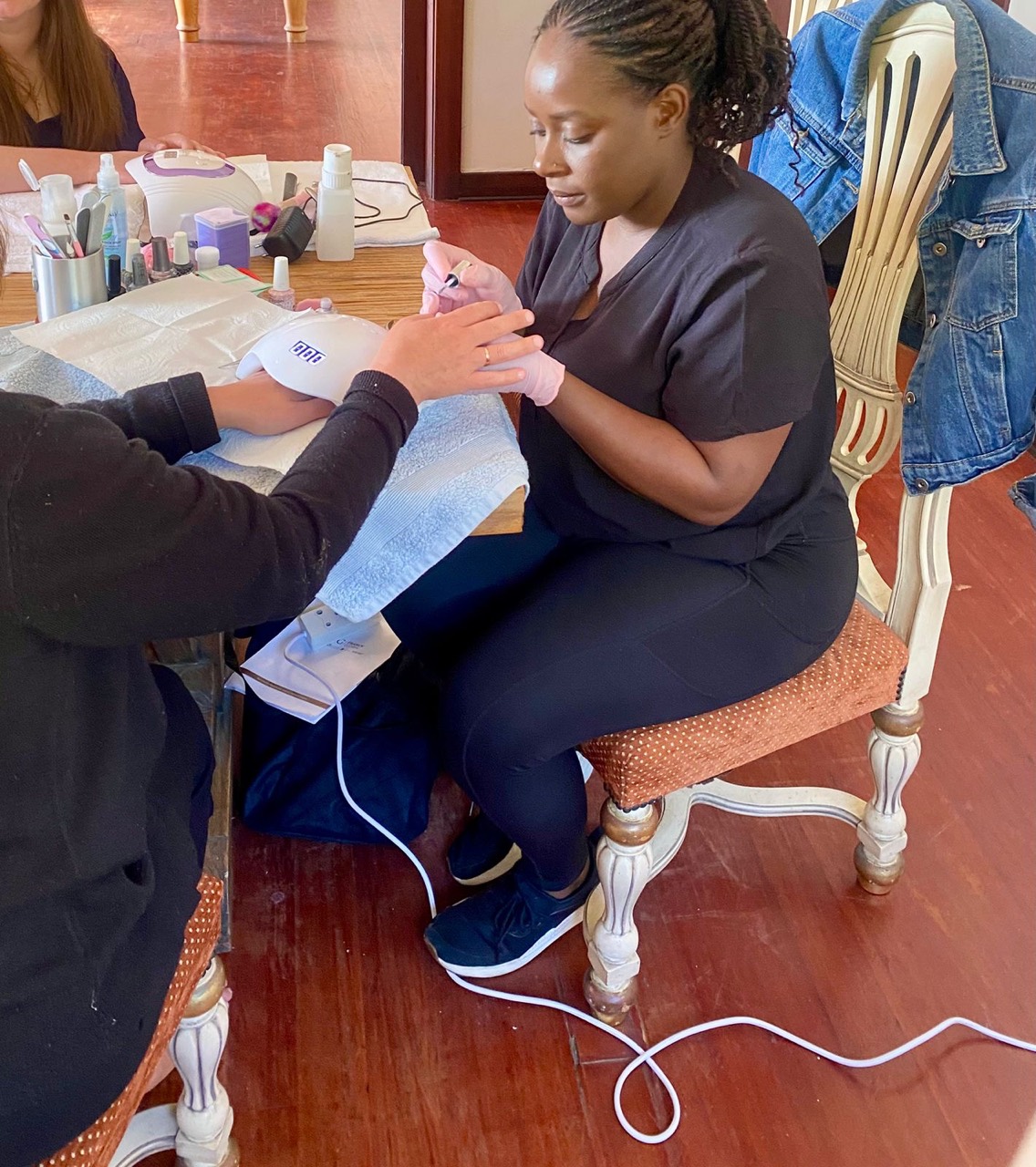 Nakai providing a mobile manicure treatment